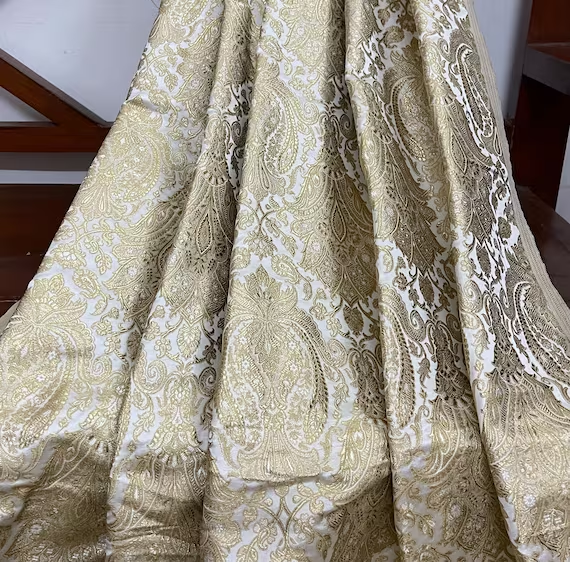 Indian Banarasi Brocade Fabric in White and Gold color,  Multiple lengths will come in the continuous piece - NF591