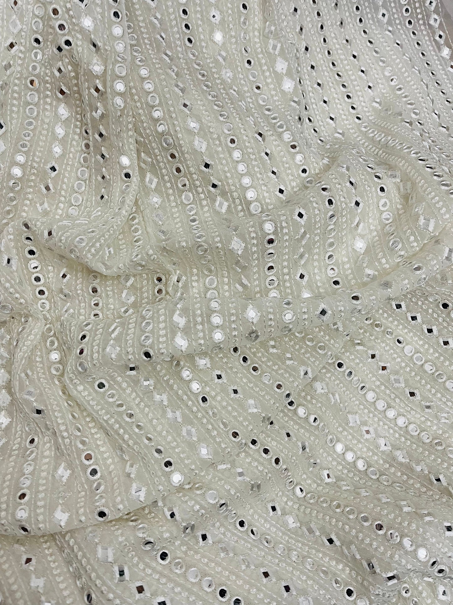 Indian Embroidered Mirror Georgette fabric in Off White color, Multiple lengths will come in the continuous piece - NF485