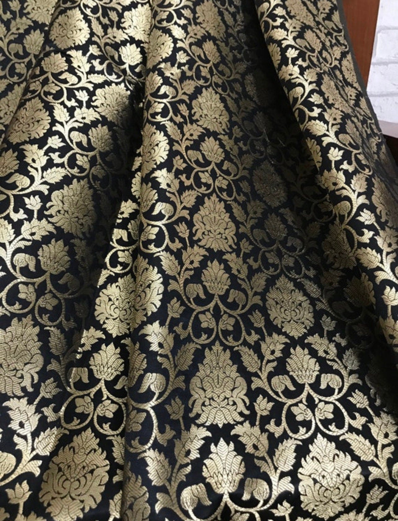 Indian Banarasi Brocade fabric in Black and Gold color, Multiple lengths will come in the continuous piece - NF642