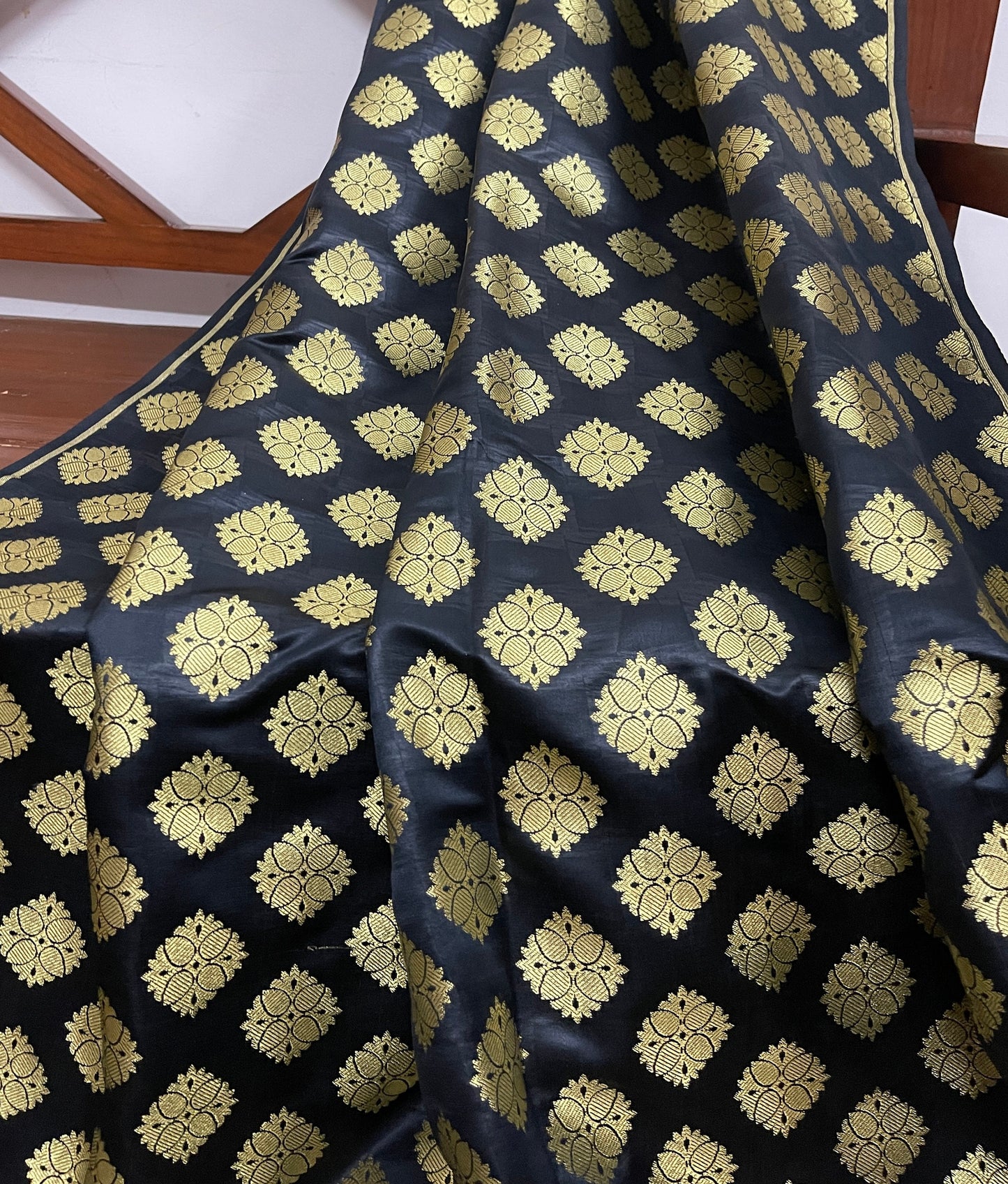 Indian Banarasi Brocade fabric in Black and Gold color, Multiple lengths will come in the continuous piece - NF309