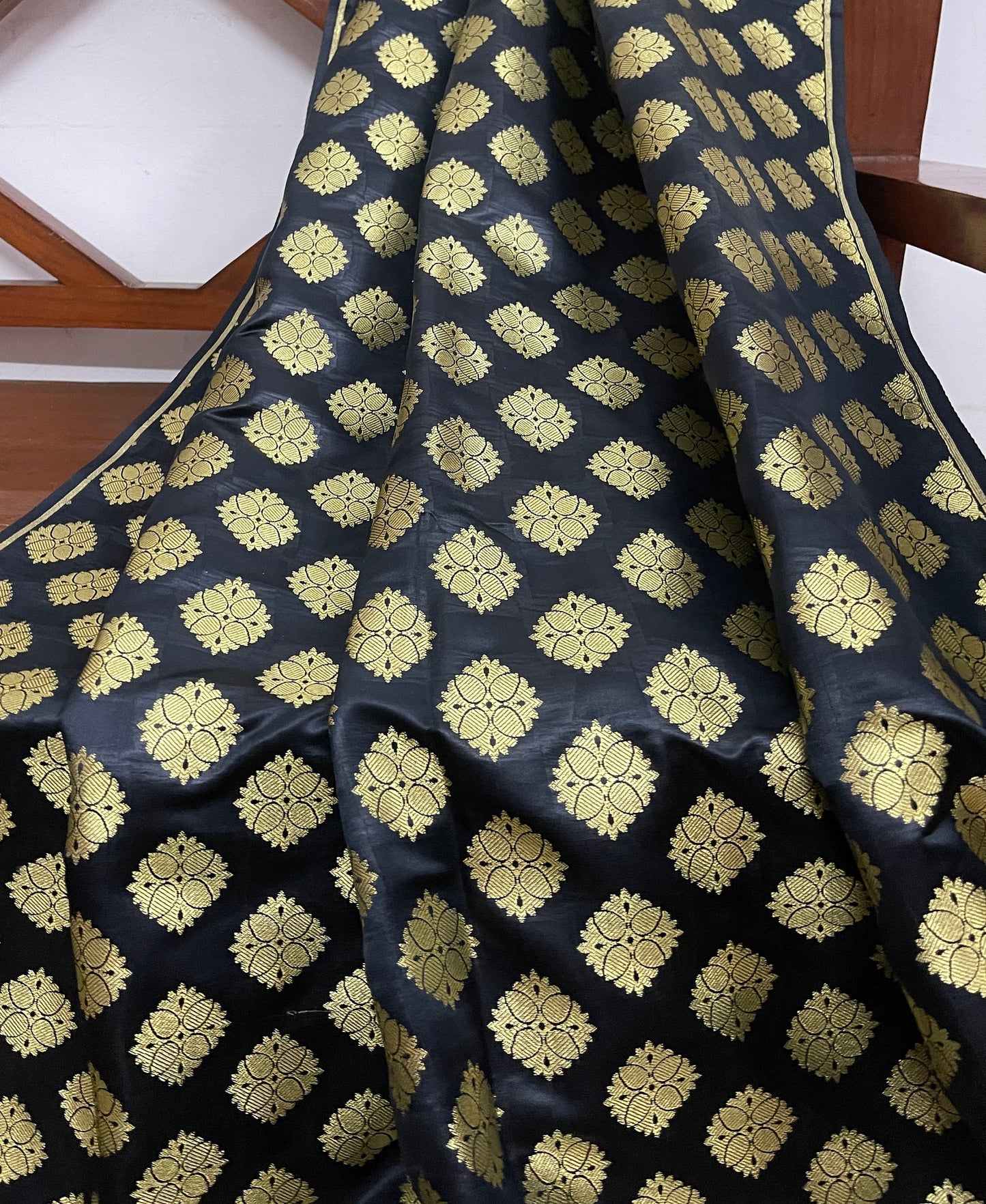 Indian Banarasi Brocade fabric in Black and Gold color, Multiple lengths will come in the continuous piece - NF309