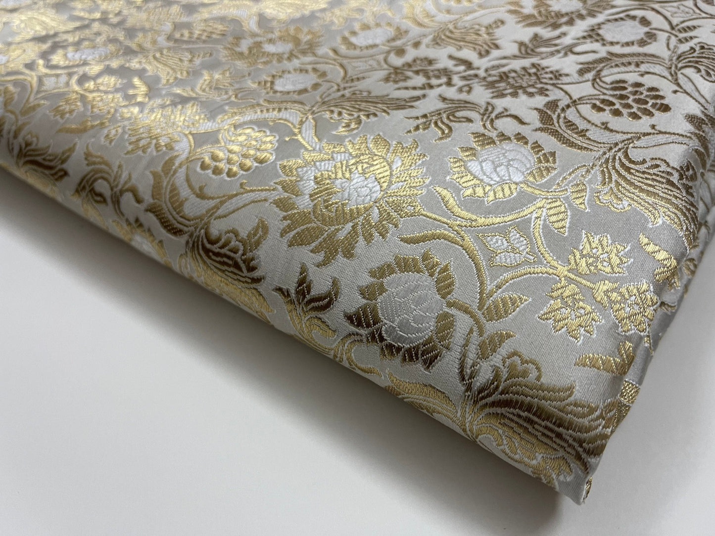 Indian Banarasi Brocade Fabric in White And Gold color, Multiple lengths will come in the continuous piece - NF567