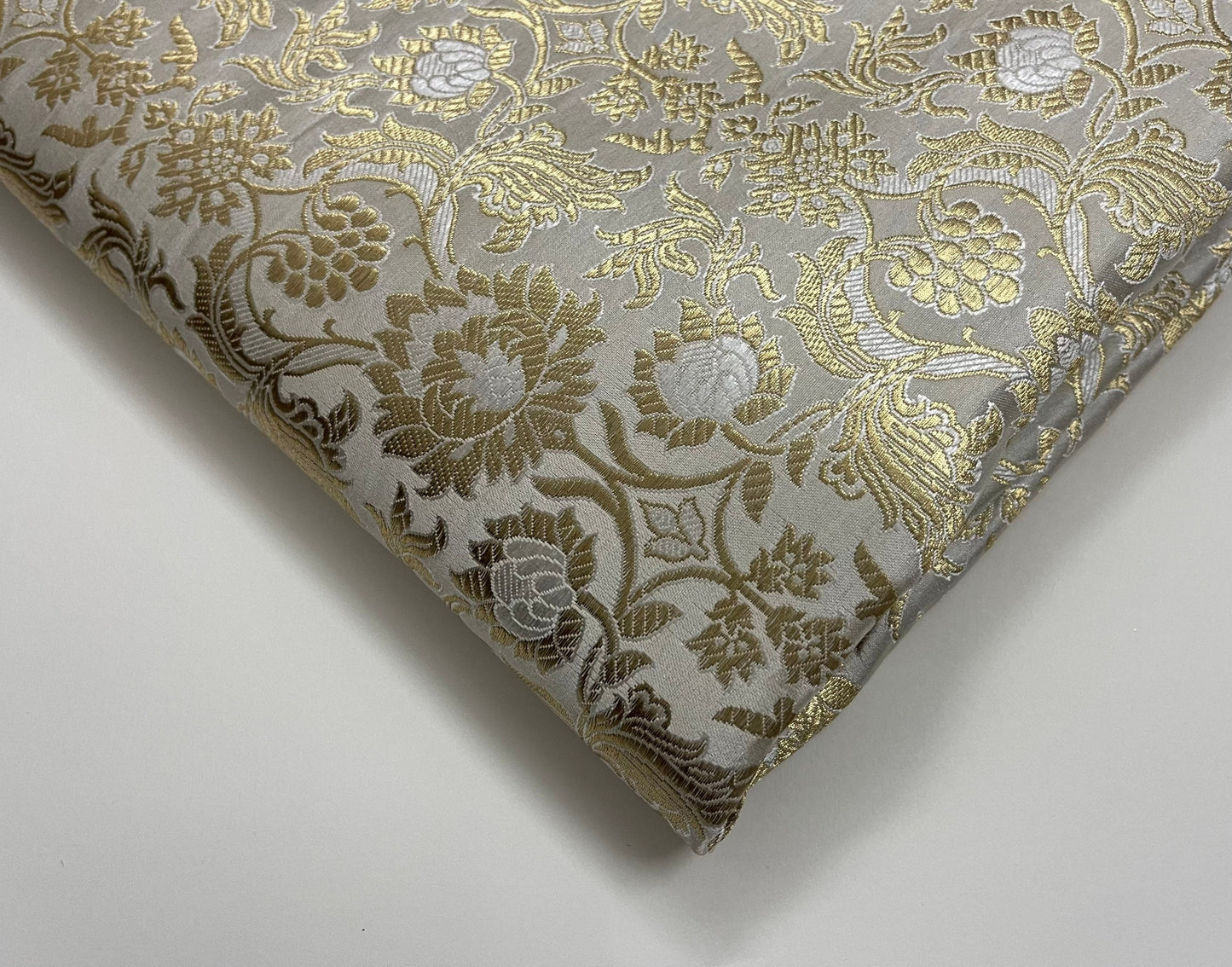 Indian Banarasi Brocade Fabric in White And Gold color, Multiple lengths will come in the continuous piece - NF567