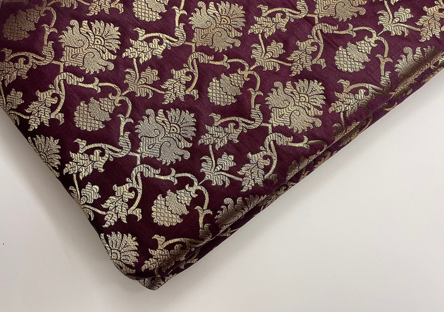 India Banarasi Brocade fabric in Burgundy Maroon And Gold color, Multiple lengths will come in a continuous piece - NF576