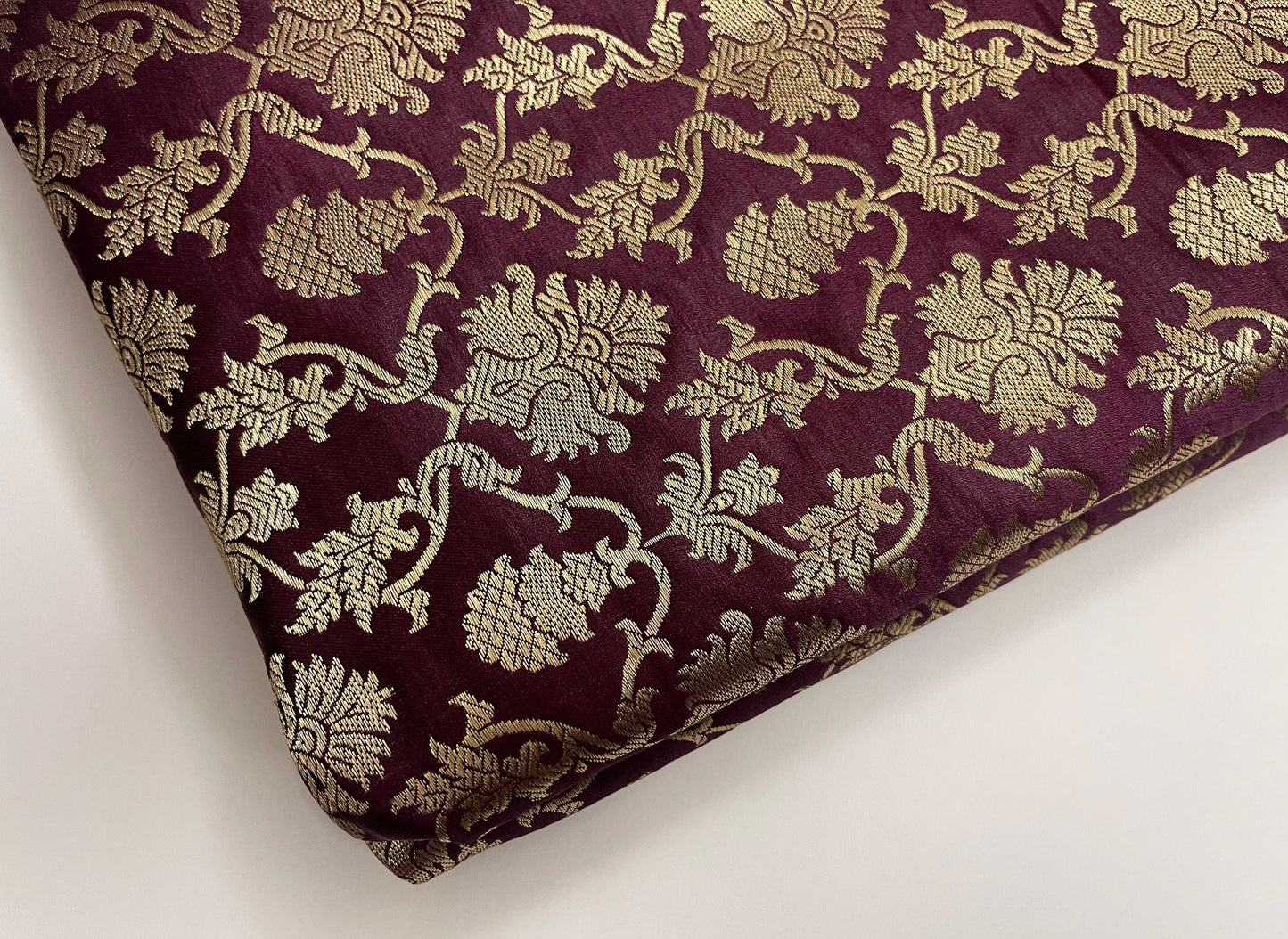 India Banarasi Brocade fabric in Burgundy Maroon And Gold color, Multiple lengths will come in a continuous piece - NF576