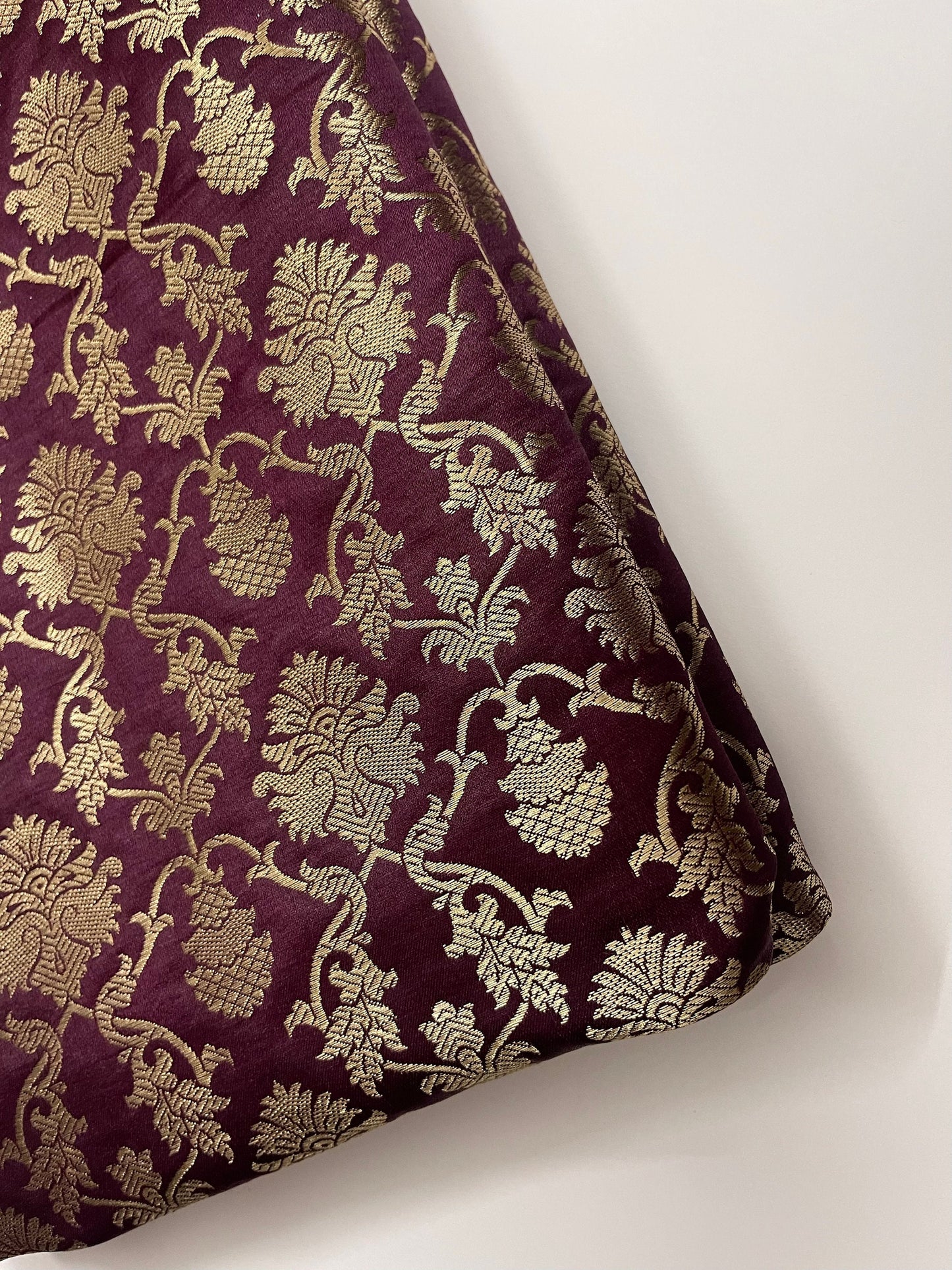 India Banarasi Brocade fabric in Burgundy Maroon And Gold color, Multiple lengths will come in a continuous piece - NF576