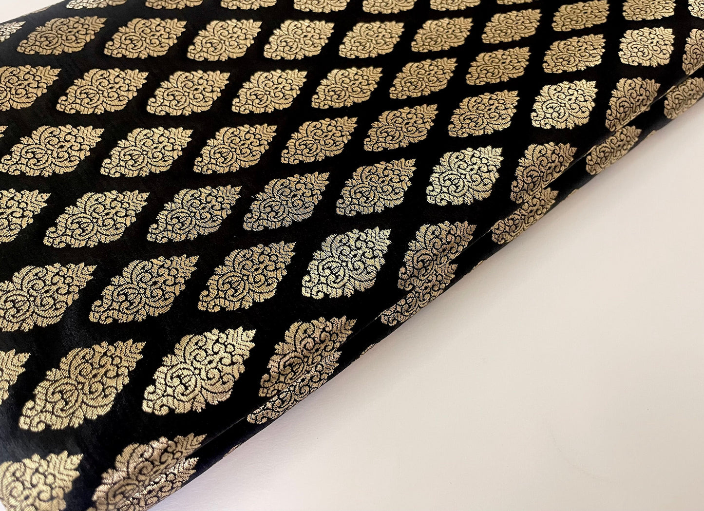 India Banarasi Brocade fabric in Black and Gold color, Multiple lengths will come in the continuous Piece - NF646