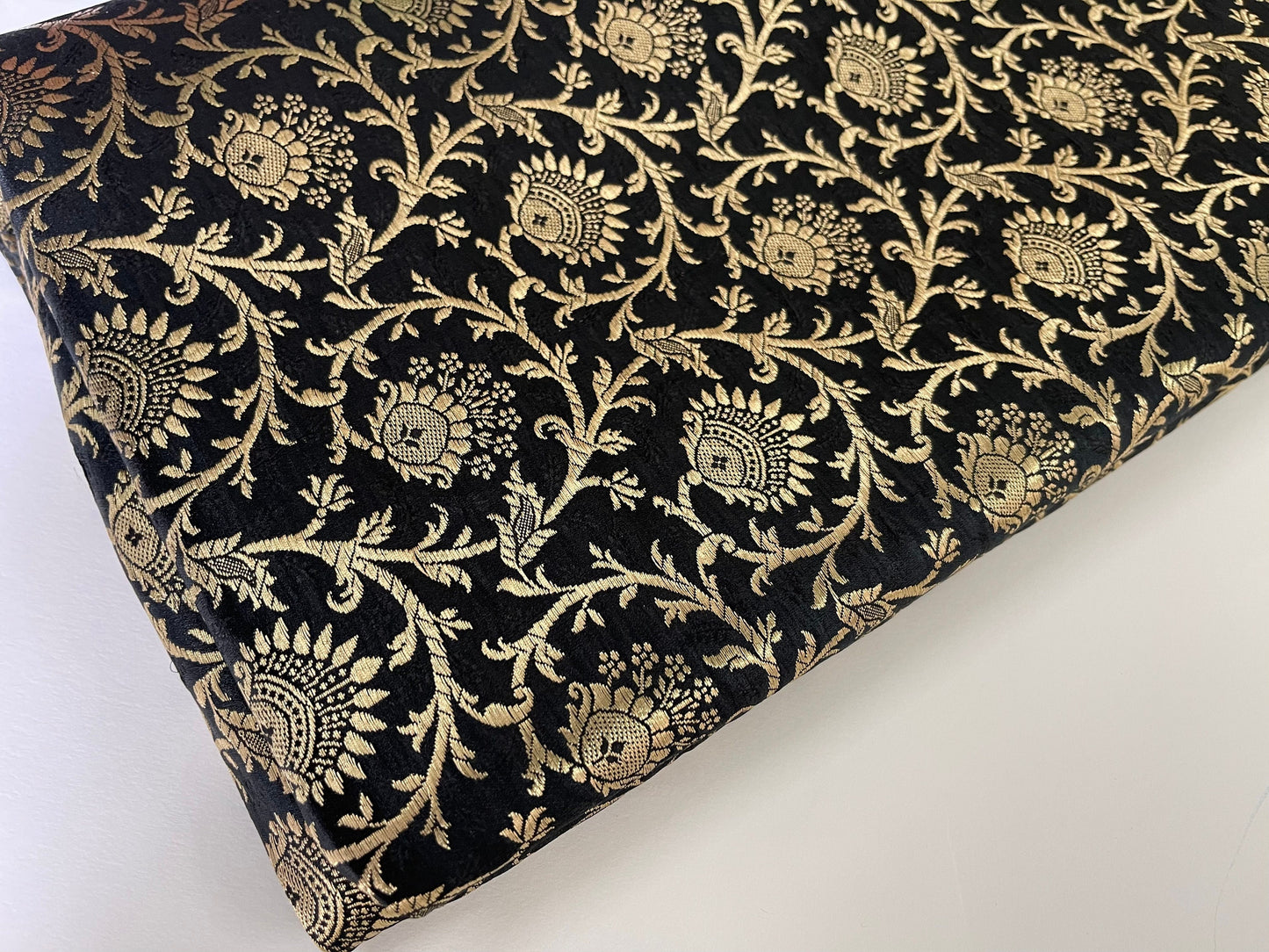 Indian Banarasi Brocade fabric in Black and Gold color, Multiple lengths will come in the continuous piece - NF631