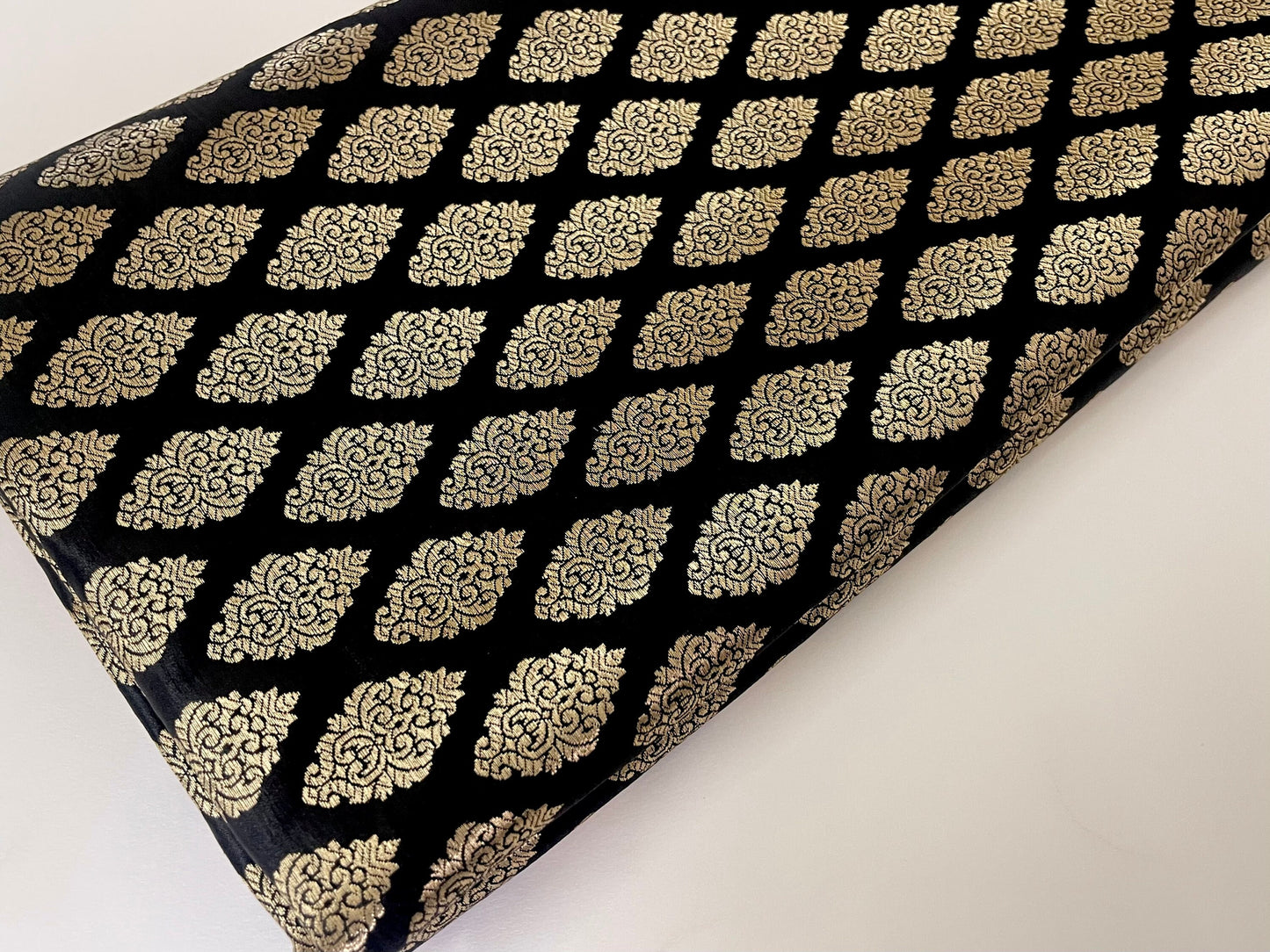 India Banarasi Brocade fabric in Black and Gold color, Multiple lengths will come in the continuous Piece - NF646